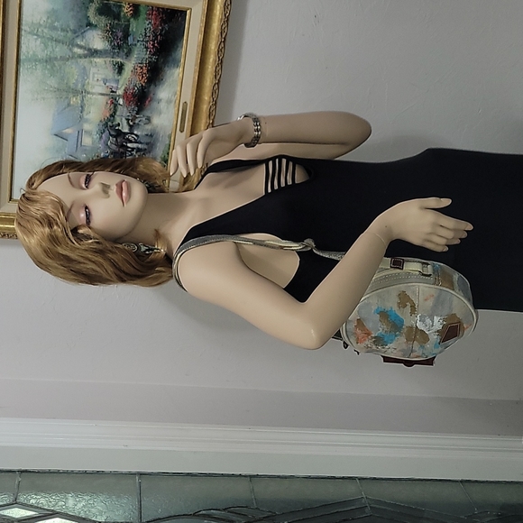 Canvas round crossbody purse. Has splashes of color. - Picture 5 of 10